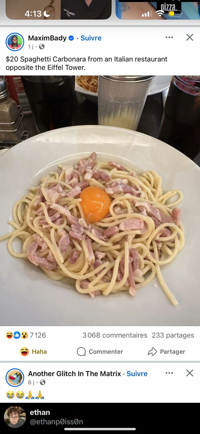 Plate of spaghetti carbonara with raw egg yolk and ham pieces, an example of food pics that deserve to be shamed online