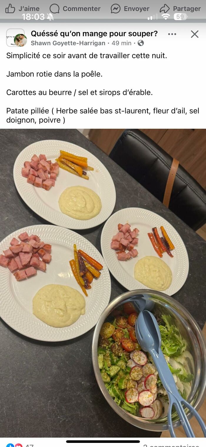 Three plates with cubed ham, roasted carrots, mashed potatoes, and a bowl of fresh salad on a dark countertop, food pics.