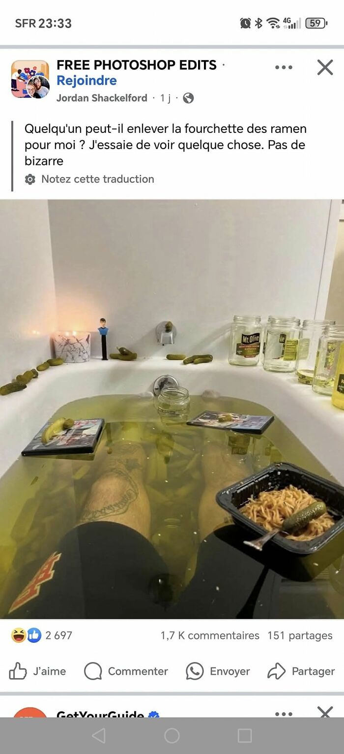 Person relaxing in a bathtub filled with pickle juice and surrounded by pickles, noodles, and empty jars in a humorous food fail.
