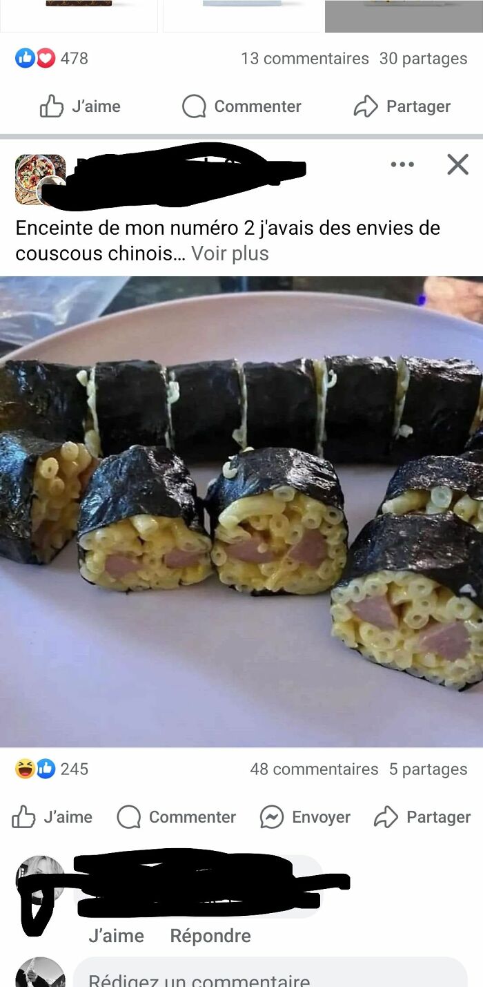 Unappetizing food pic of sushi rolls made with macaroni and hot dog pieces wrapped in seaweed.