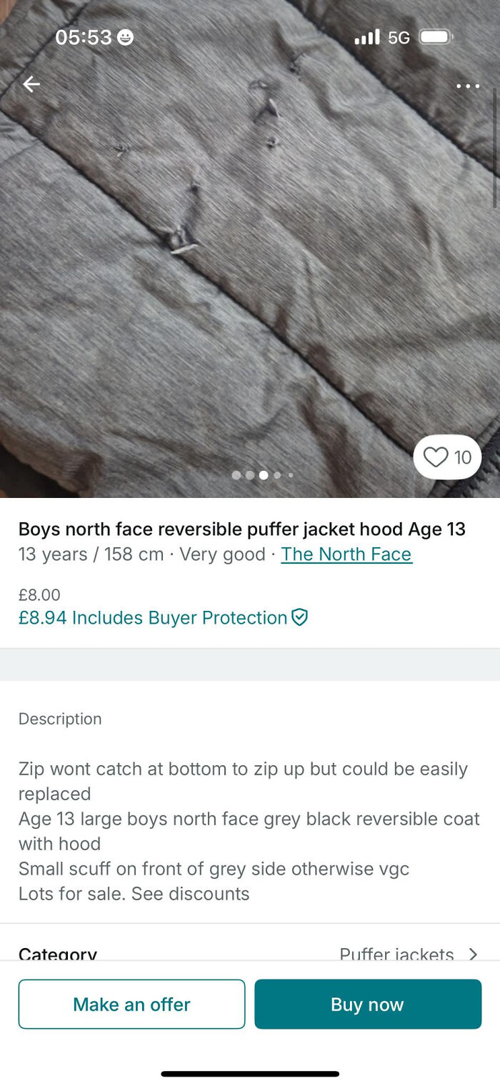 Worn grey boys North Face reversible puffer jacket listing with zipper issues on resale platform Vinted post.