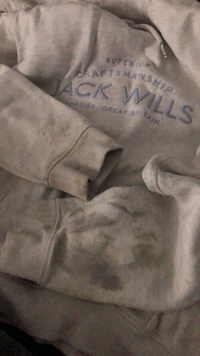 Faded Jack Wills sweatshirt with visible stains and wear featured in unhinged Vinted posts causing double take.