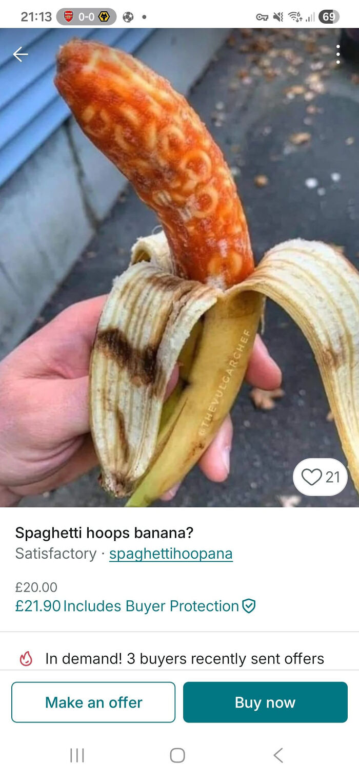 Peeling banana with a cooked spaghetti hoops sausage inside, a humorous unhinged Vinted post that surprises viewers.