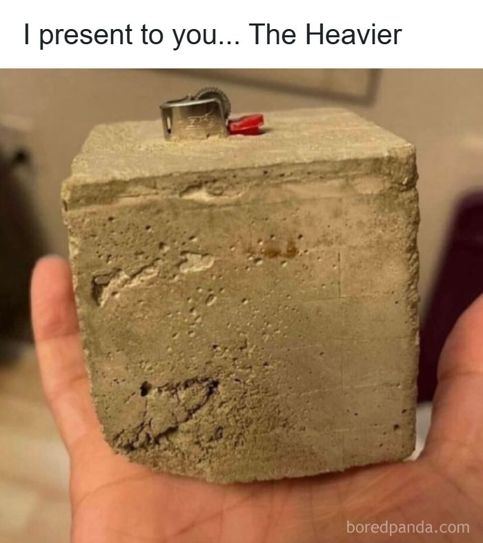 Hand holding a heavy concrete block lighter than it looks, illustrating a funny dad joke about weight.
