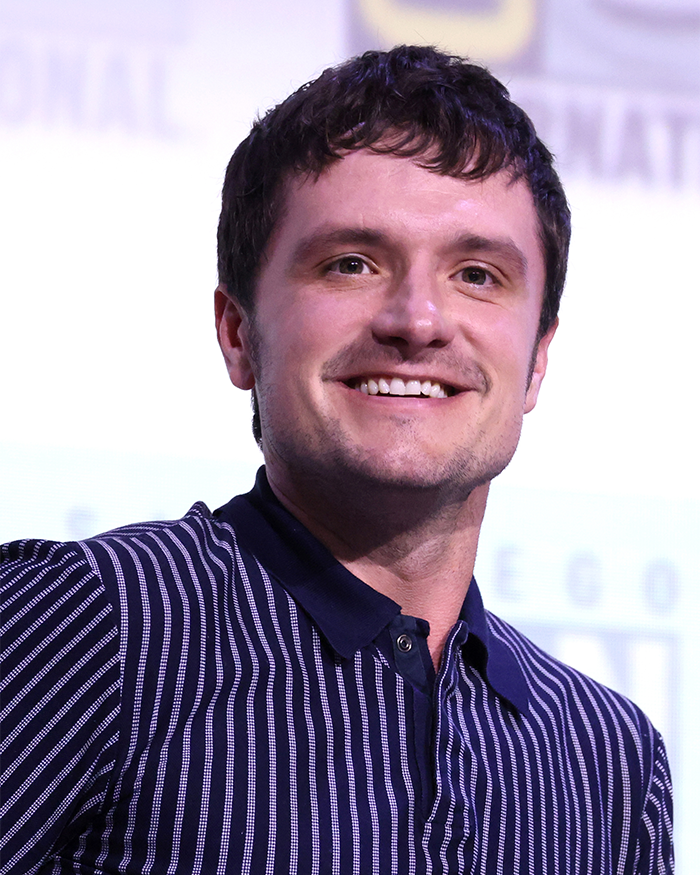 Josh Hutcherson smiling at an event, sparking a snarky comment about Taylor Swift and debate online. Josh Hutcherson smiling at an event, sparking a snarky comment about Taylor Swift and debate online.