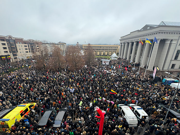 Large crowd gathered outside a government building in Lithuania during protests linked to national broadcaster leadership changes. Large crowd gathered outside a government building in Lithuania during protests linked to national broadcaster leadership changes.