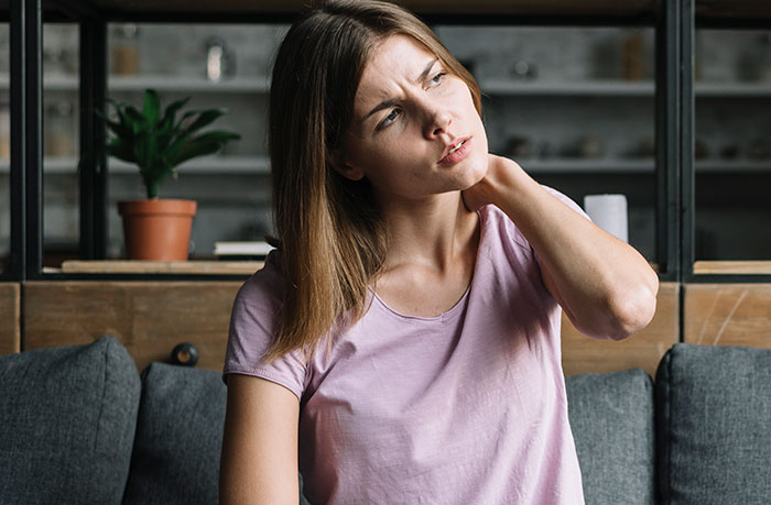 Woman looking confused and frustrated indoors, illustrating mansplained moments with peak confidence and zero accuracy.