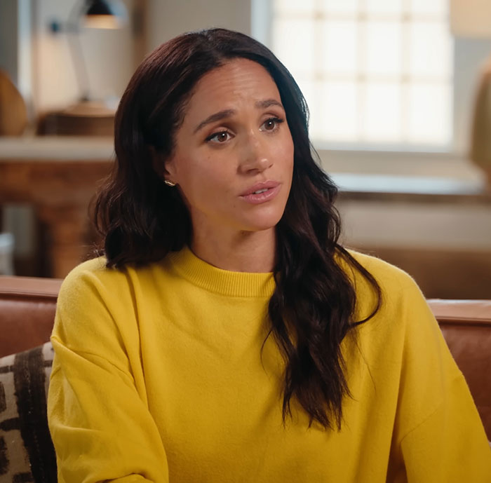Meghan Markle seated indoors in a yellow sweater, illustrating PR gurus cutting ties with Prince Harry and Meghan Markle. Meghan Markle seated indoors in a yellow sweater, illustrating PR gurus cutting ties with Prince Harry and Meghan Markle.