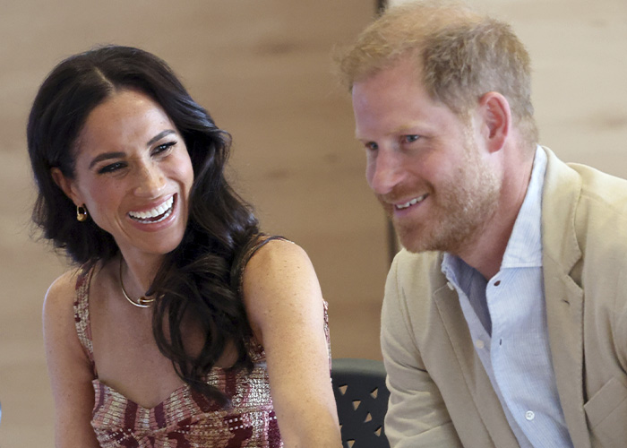 Meghan Markle and Prince Harry engaged in conversation, highlighting the publicist changes in their team. Meghan Markle and Prince Harry engaged in conversation, highlighting the publicist changes in their team.
