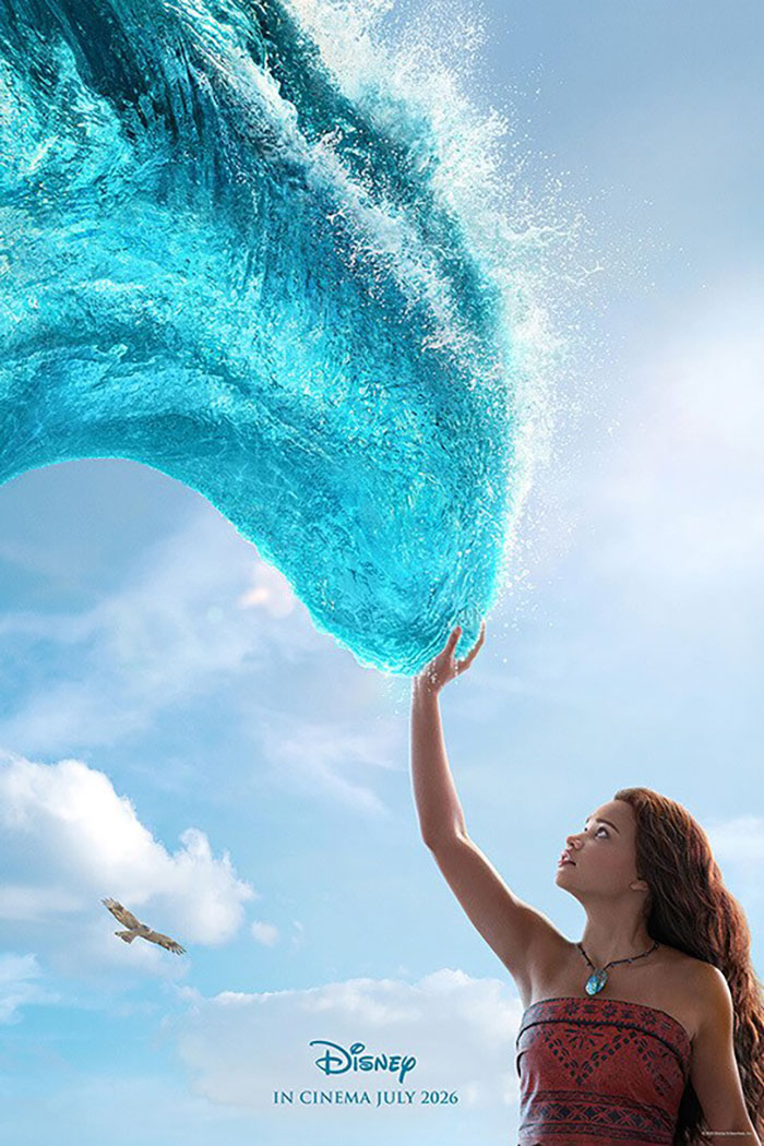 Young woman in tribal dress reaches out to a large wave of water, symbolizing Disney remakes facing criticism and controversies. Young woman in tribal dress reaches out to a large wave of water, symbolizing Disney remakes facing criticism and controversies.