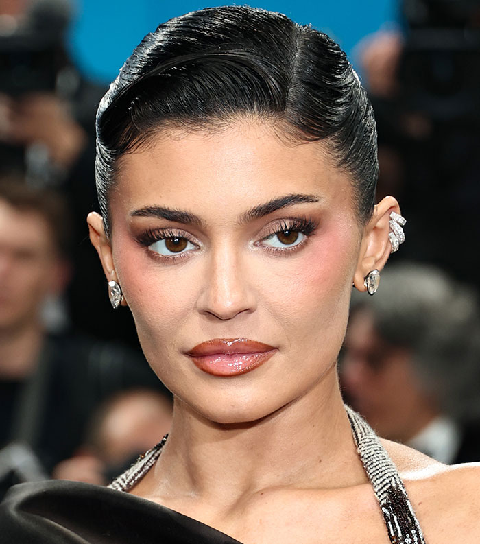 Close-up of a female celebrity with makeup and sleek hairstyle representing the most disliked celebrities of 2025.