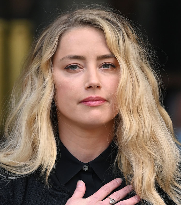 Blonde woman with long wavy hair and serious expression, representing most disliked celebrities of 2025.