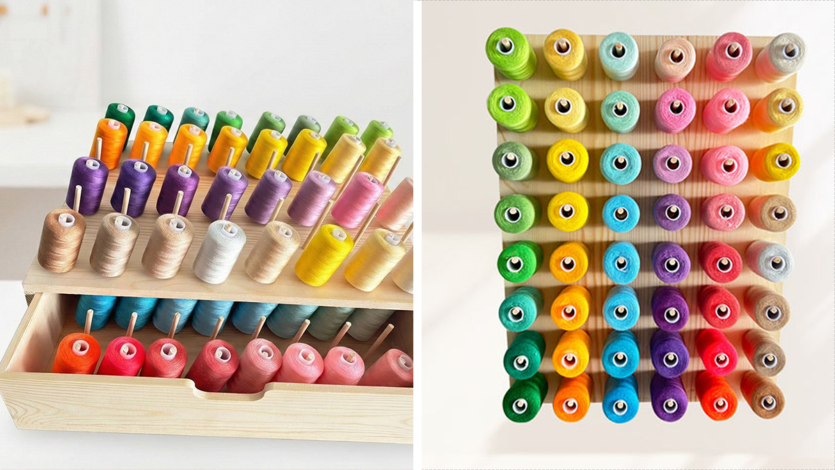 Colorful sewing thread spools organized in a wooden holder, a perfect gift idea for mother-in-law craft enthusiasts.