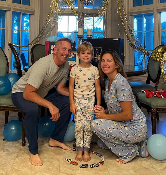Greg Biffle's wife and family smiling indoors with decorations, capturing a moment before the plane crash incident.
