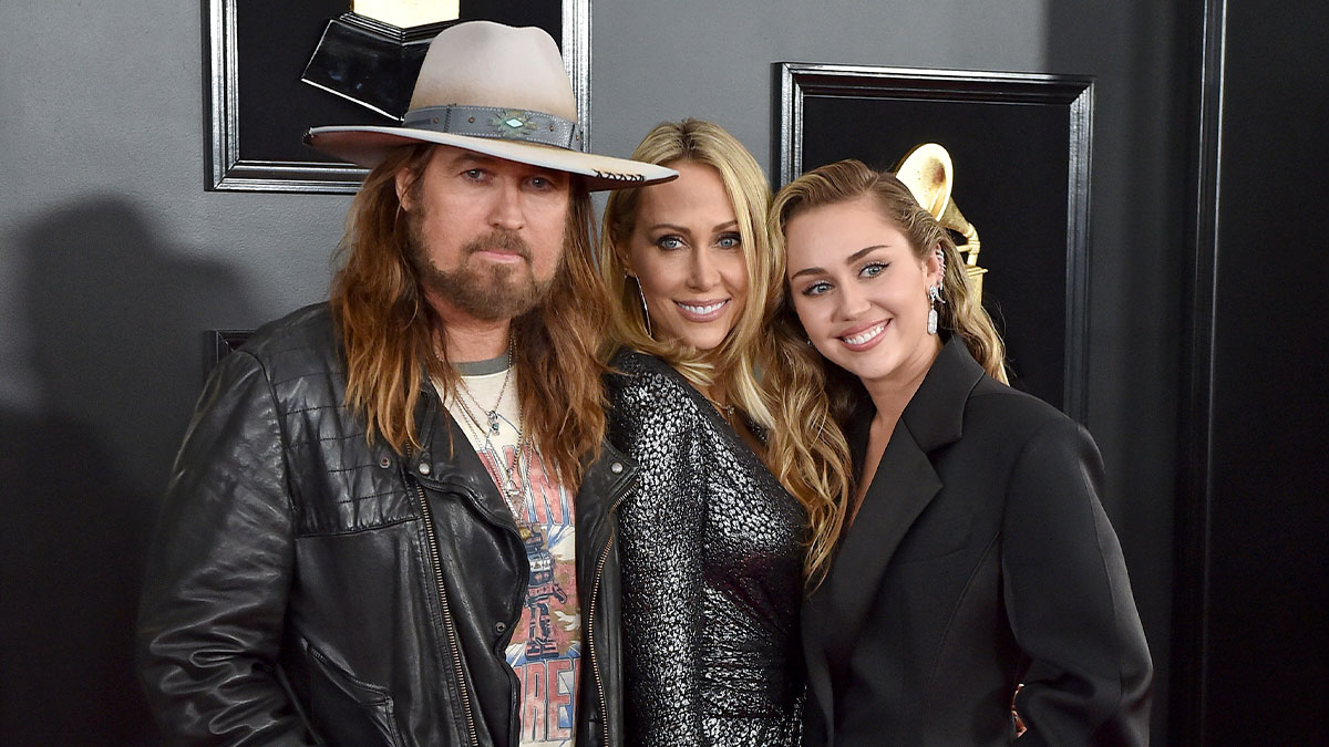 Three people posing at an event, representing nepo babies who turned into nope babies and left famous families.