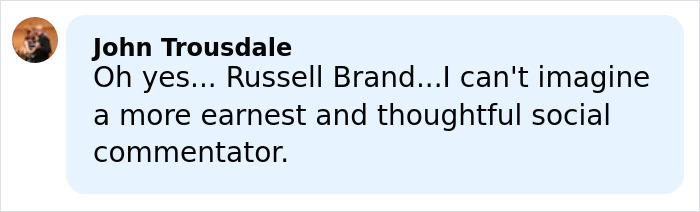 Commenter John Trousdale praising Russell Brand as an earnest and thoughtful social commentator in a light blue chat bubble.