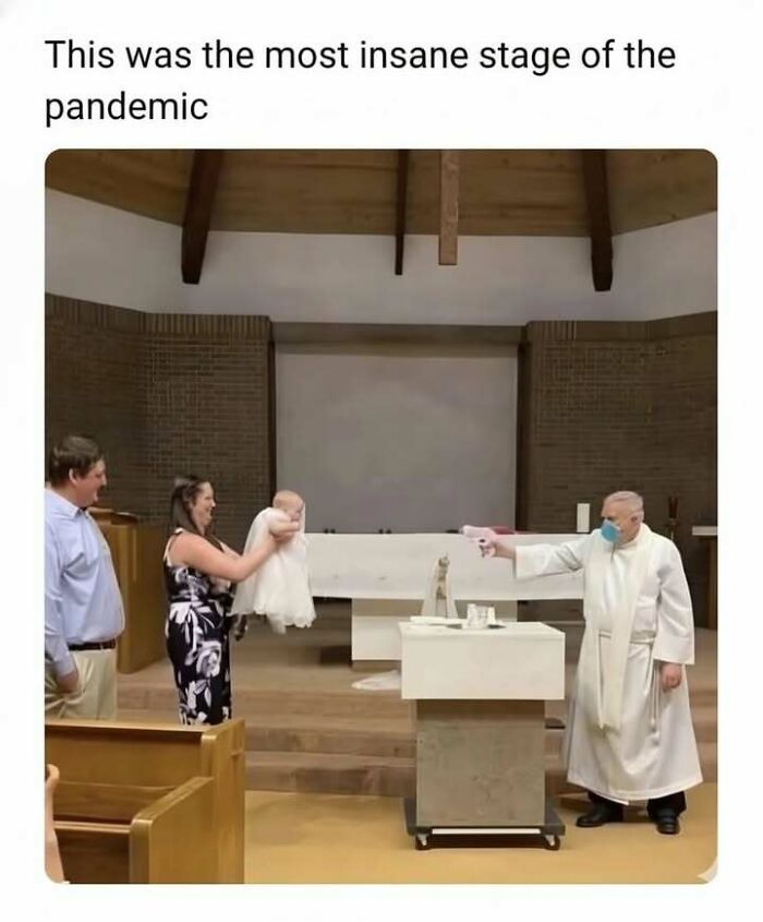 Family holding baby stretched out toward masked priest using a sanitizer spray during pandemic, funny meme from hilarious memes collection.