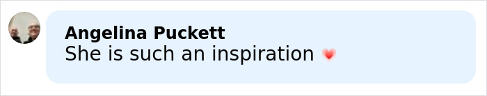 Comment saying she is such an inspiration with a red heart emoji on a light blue background. Comment saying she is such an inspiration with a red heart emoji on a light blue background.