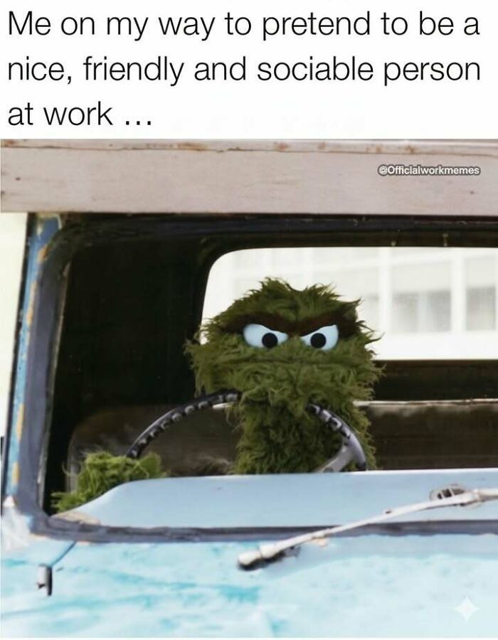 Oscar the Grouch driving a car with an angry expression, representing hilarious memes about stress relief at work.