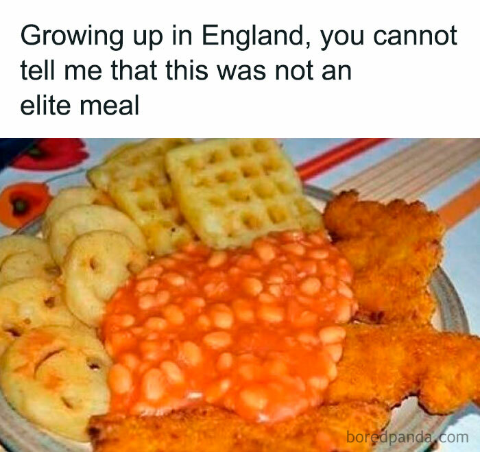 Plate with baked beans, smiley fries, waffles, and fried chicken illustrating hilarious food memes humor about classic meals.