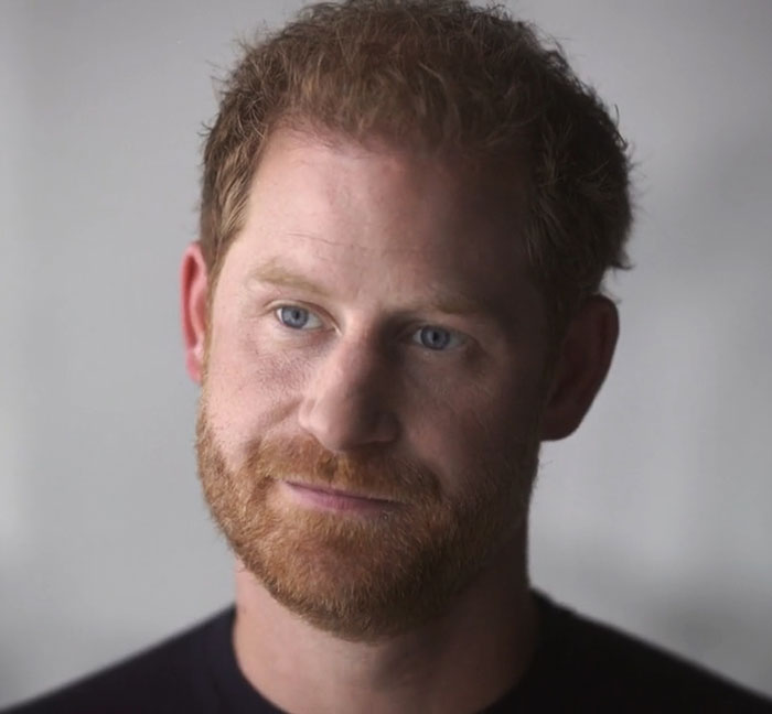 Close-up of a red-haired man with a beard and blue eyes, illustrating PR gurus cutting ties with Prince Harry and Meghan Markle.