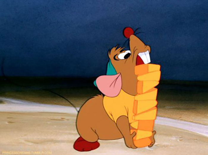 Animated mouse character holding large stack of cheese pieces, illustrating truly random facts in a playful scene.