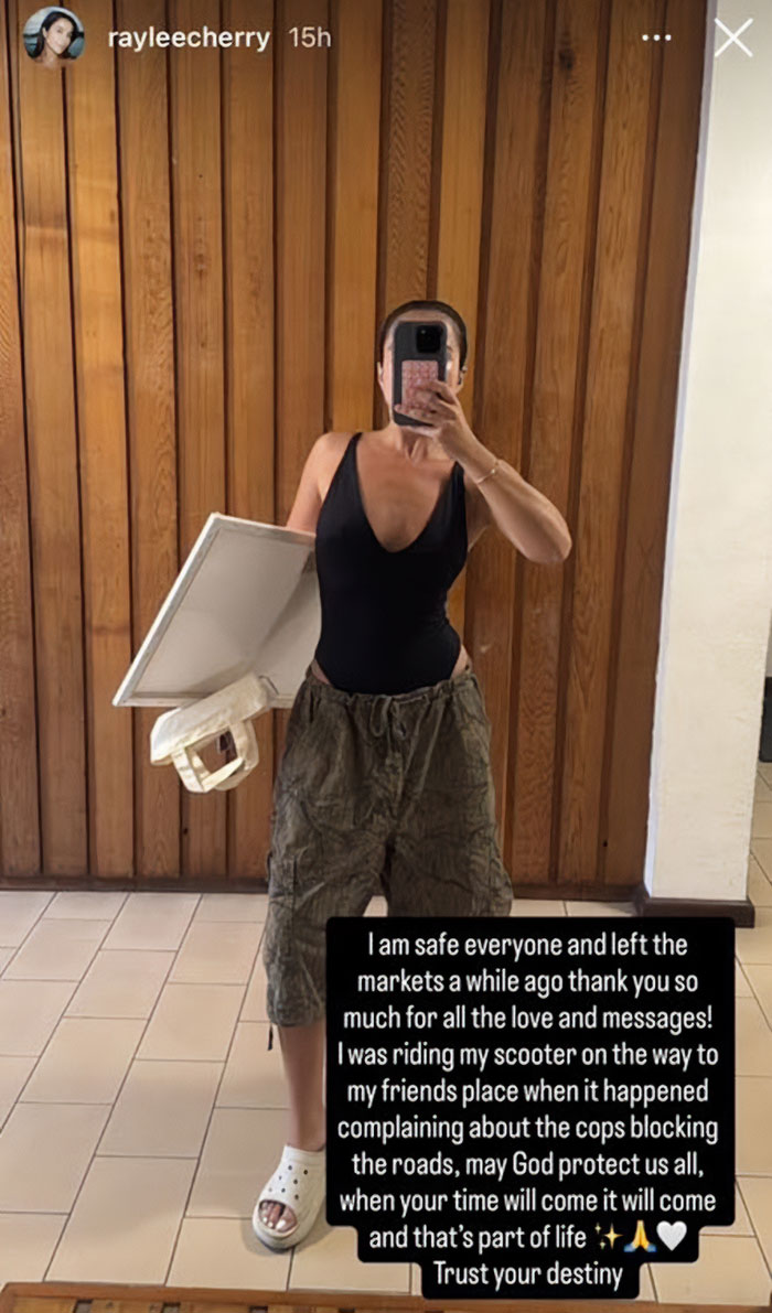 Swimwear model taking mirror selfie in black suit and cargo shorts, sparking outrage with tone deaf posts after Bondi Beach attack. Swimwear model taking mirror selfie in black suit and cargo shorts, sparking outrage with tone deaf posts after Bondi Beach attack.