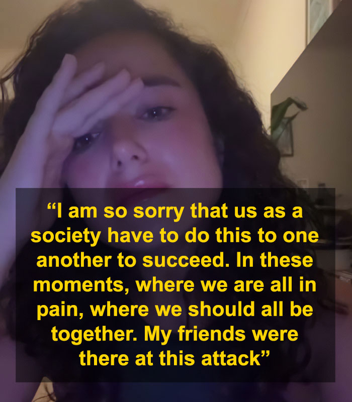 Young woman with curly hair holding her head, expressing distress after Bondi Beach attack controversy involving swimwear model. Young woman with curly hair holding her head, expressing distress after Bondi Beach attack controversy involving swimwear model.