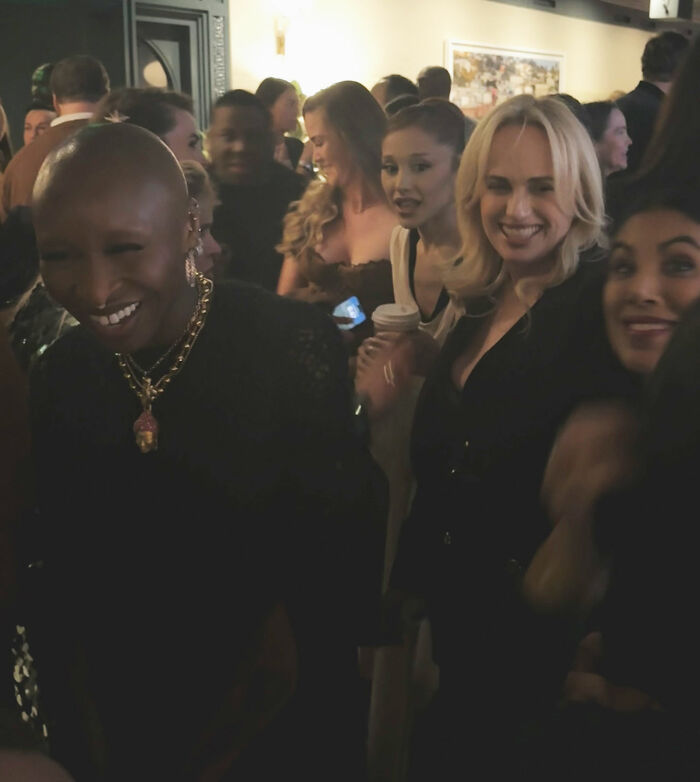 Rebel Wilson and Ariana Grande at a crowded event with people noticing a bizarre detail in the shared photo. Rebel Wilson and Ariana Grande at a crowded event with people noticing a bizarre detail in the shared photo.