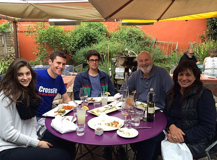 Group of people sitting outdoors at a round table enjoying a meal, relating to Michelle Obama breaking her silence. Group of people sitting outdoors at a round table enjoying a meal, relating to Michelle Obama breaking her silence.