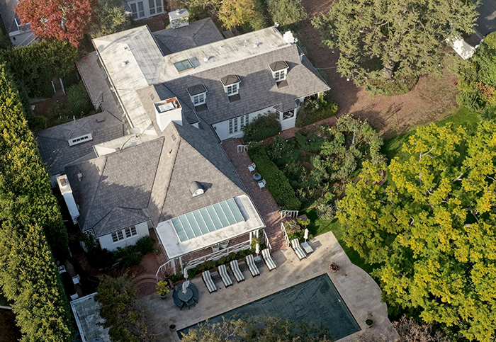 Aerial view of a large residential property with pool and garden, related to Rob Reiner's disturbing last words confession. Aerial view of a large residential property with pool and garden, related to Rob Reiner's disturbing last words confession.