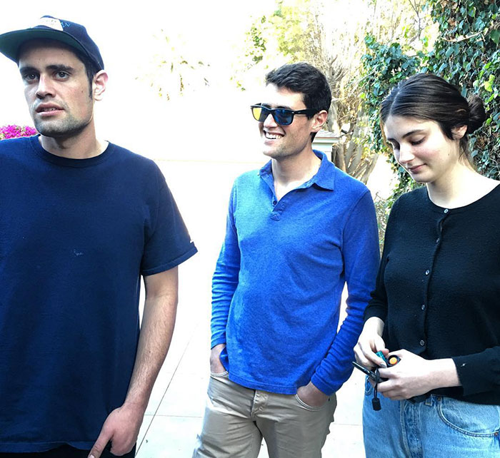 Three young adults casually standing outside, illustrating Rob Reiner's disturbing last words and confession about son. Three young adults casually standing outside, illustrating Rob Reiner's disturbing last words and confession about son.
