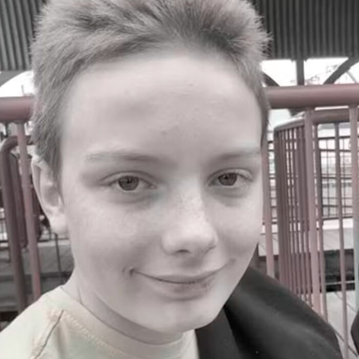 Close-up of a smiling schoolboy aged 12 outdoors, related to investigation of squid game prank incident. Close-up of a smiling schoolboy aged 12 outdoors, related to investigation of squid game prank incident.
