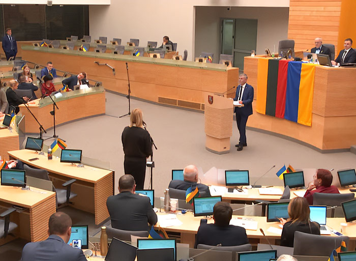 Lithuanian parliament session with lawmakers discussing new law involving lawmaker’s cat and broadcaster head firing. Lithuanian parliament session with lawmakers discussing new law involving lawmaker’s cat and broadcaster head firing.