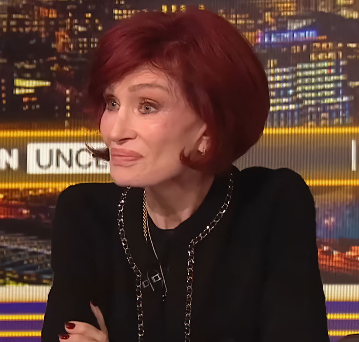 Sharon Osbourne speaking on a TV set with a cityscape background, discussing Kelly’s heartbreaking weight loss. Sharon Osbourne speaking on a TV set with a cityscape background, discussing Kelly’s heartbreaking weight loss.