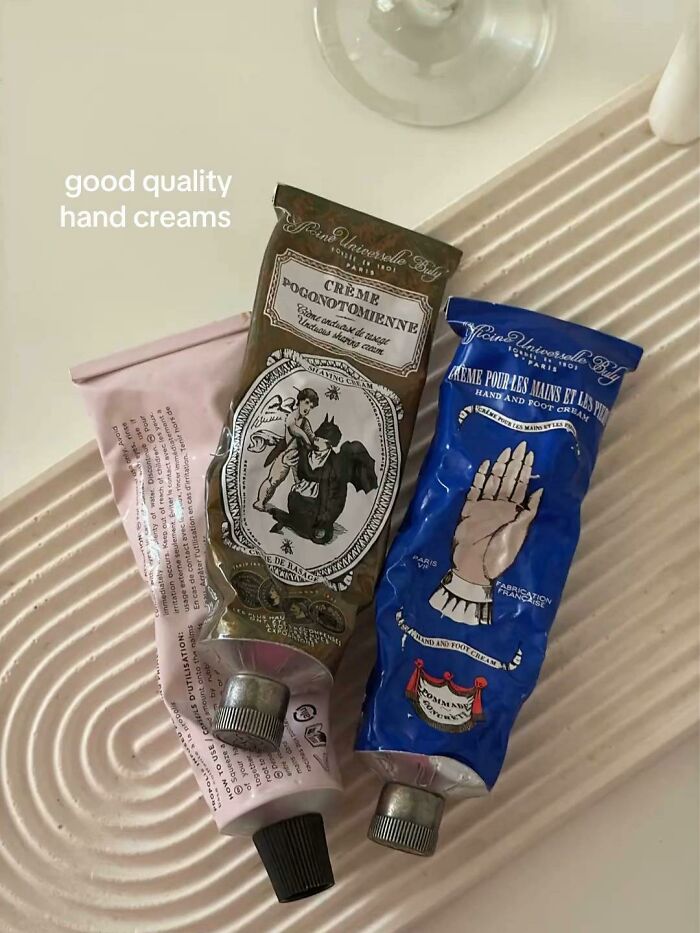 Three tubes of good quality hand creams on a textured surface, a top Christmas gifts people recommend.