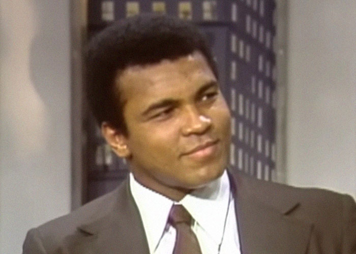 Close-up of a celebrity on a TV talk show, representing people sharing impressions of celebrities they’ve met.