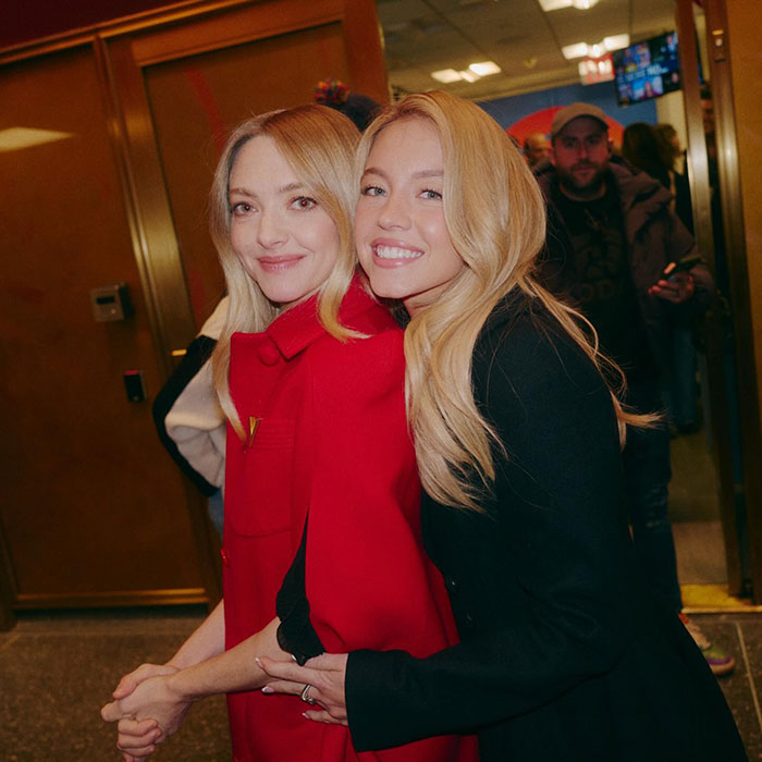 Sydney Sweeney and Amanda Seyfried smiling and posing together in a candid moment sparking media bias and racial double standards debate Sydney Sweeney and Amanda Seyfried smiling and posing together in a candid moment sparking media bias and racial double standards debate