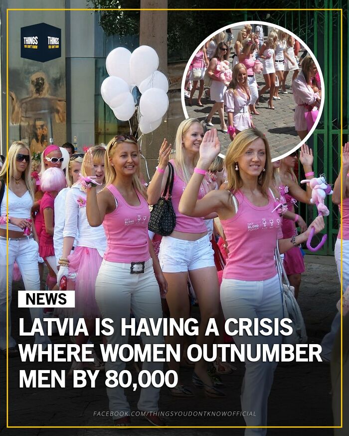 Group of women in pink and white outfits walking and waving, a compelling fact about women outnumbering men in Latvia.