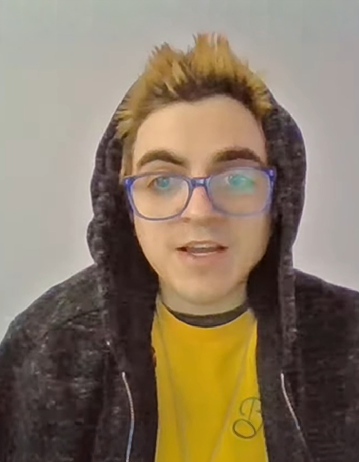 Former child actor Tylor Chase wearing glasses and hoodie discussing recent troubles in a casual indoor setting. Former child actor Tylor Chase wearing glasses and hoodie discussing recent troubles in a casual indoor setting.