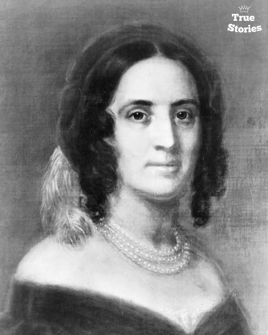 Portrait of an important American personality from history, showcasing notable features and period clothing in black and white.