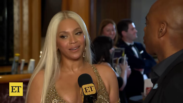 Celebrity interview in a glamorous setting revealing fascinating secrets shared by those who once worked with them.