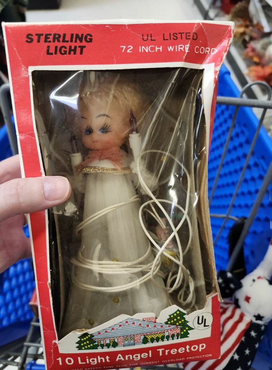 Vintage Christmas angel treetop decoration in original box with tangled wire cord, a nostalgic vintage Christmas decoration.