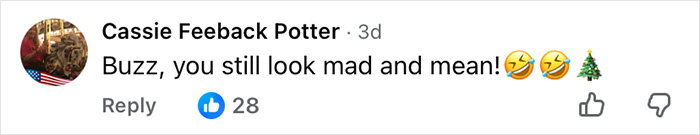 User comment on social media saying Buzz still looks mad and mean with laughing emojis and a Christmas tree icon.