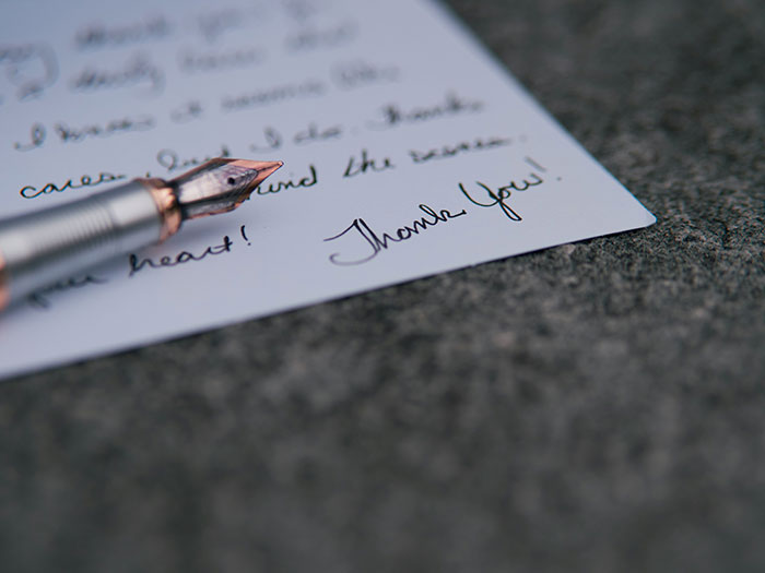 Fountain pen resting on a handwritten note, symbolizing a teacher's message sparking a mom's furious reaction. Fountain pen resting on a handwritten note, symbolizing a teacher's message sparking a mom's furious reaction.
