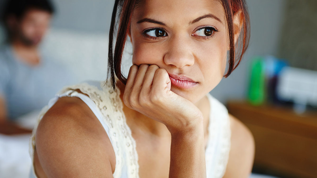 Woman looking upset and frustrated after hubby backs out of deal to help clean up after Thanksgiving meal.