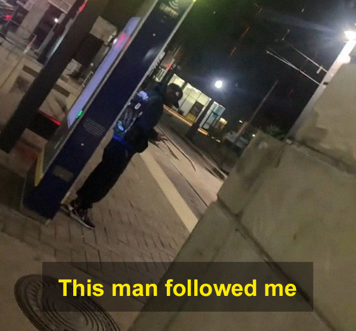 Man standing alone at night on a dimly lit street as woman scares off men stalkers with period pad tactic. Man standing alone at night on a dimly lit street as woman scares off men stalkers with period pad tactic.