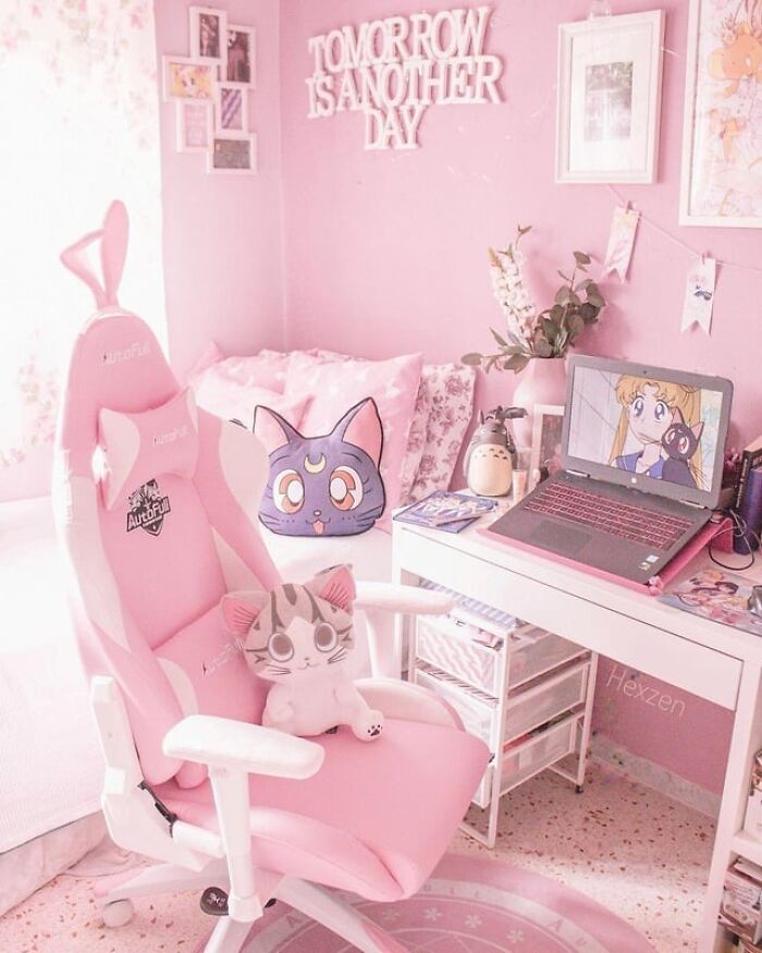 Pink-themed home office setup with gaming chair, plush toys, and anime on laptop, illustrating startling home service scenes.