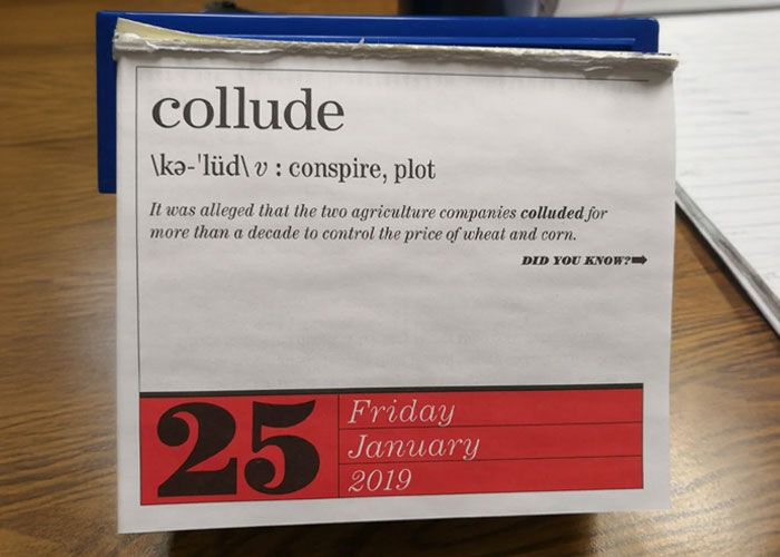 Desk calendar page showing the word collude with definition and example dated January 25, 2019, symbolizing insensitive presents.