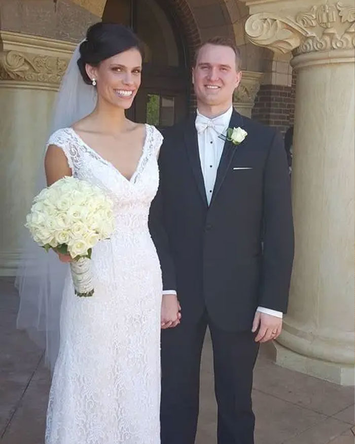 Bride and groom holding hands outside, related to ex FBI agent suggesting motive in Ohio dentist homicide case. Bride and groom holding hands outside, related to ex FBI agent suggesting motive in Ohio dentist homicide case.